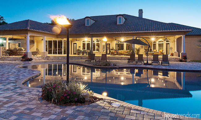 Torches add flair to a back yard design