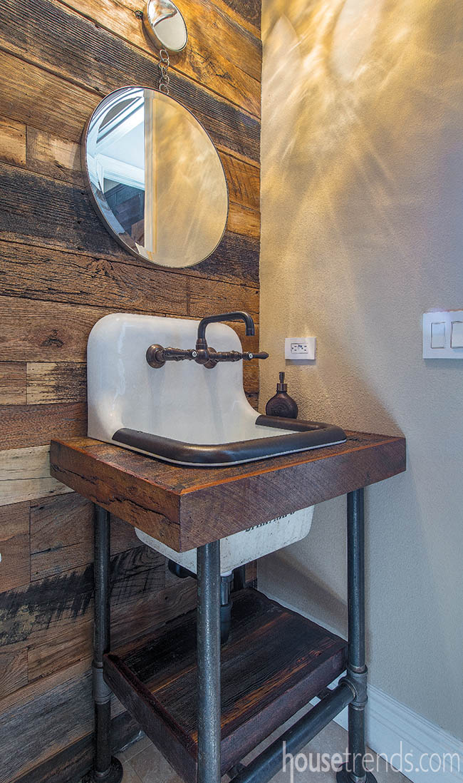 Shiplap adds a rustic vibe to a powder room
