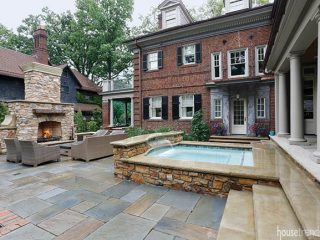 Back yard flaunts a gorgeous bluestone patio