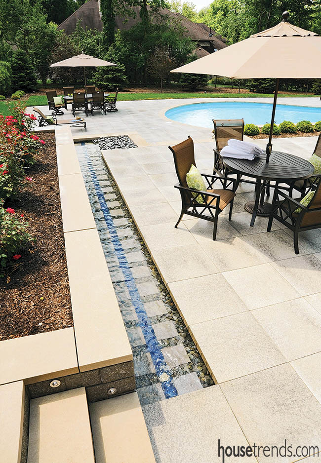 Water feature glistens in light and dark