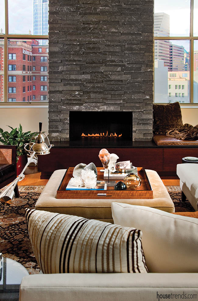Vertical fireplace heightens the drama of a space