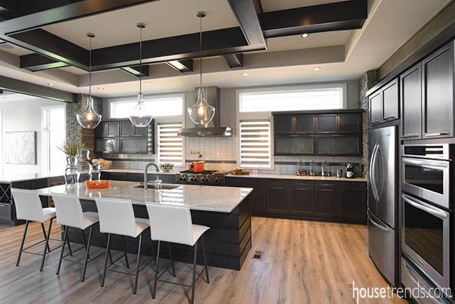 Dark maple cabinets contrast with flooring