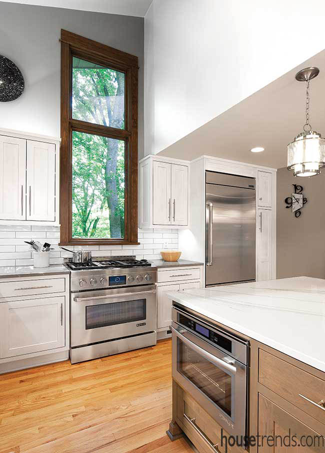 Large window adds natural light to a kitchen