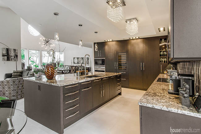 Oversized hardware piques interest in a contemporary kitchen