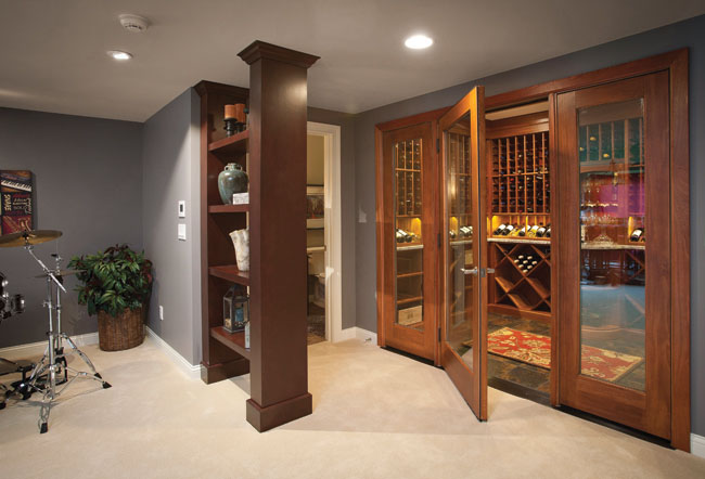 Modern bathroom is cleverly hidden by column