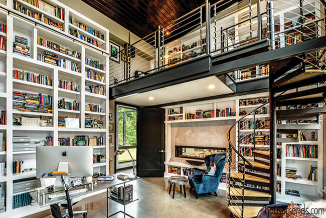 Two-sided fireplace warms up a library