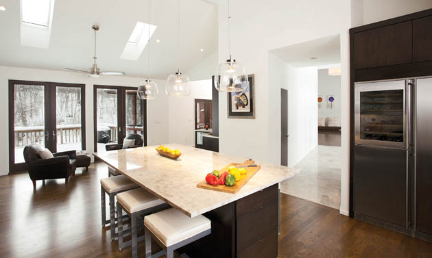 Open kitchen design achieves separate spaces