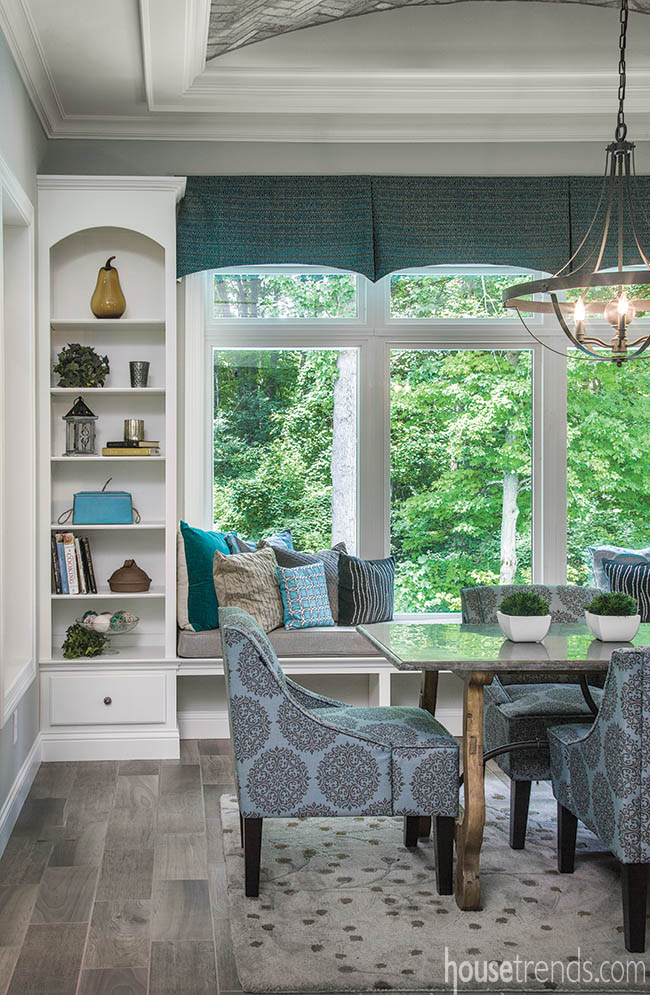 Throw pillows add color to a window seat