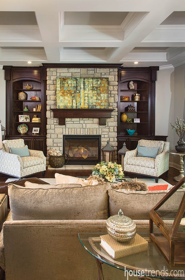 Great room boasts tray ceiling and custom woodwork