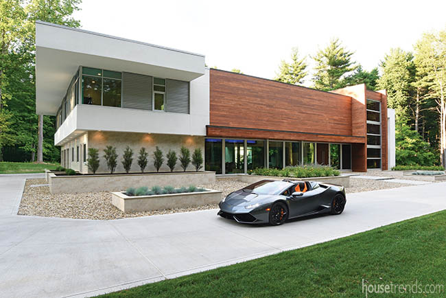 Lamborghini in front of a contemporary home