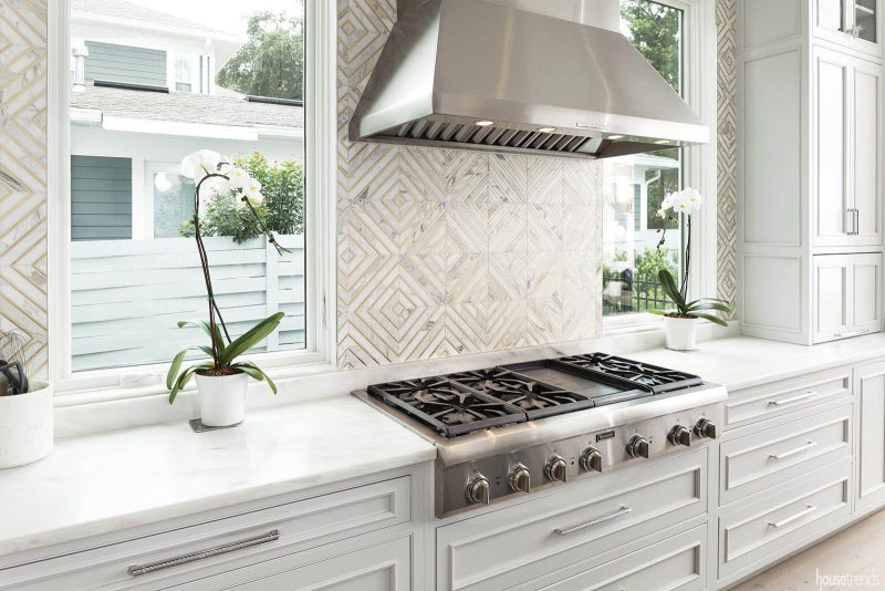 Backsplash stretches to the ceiling