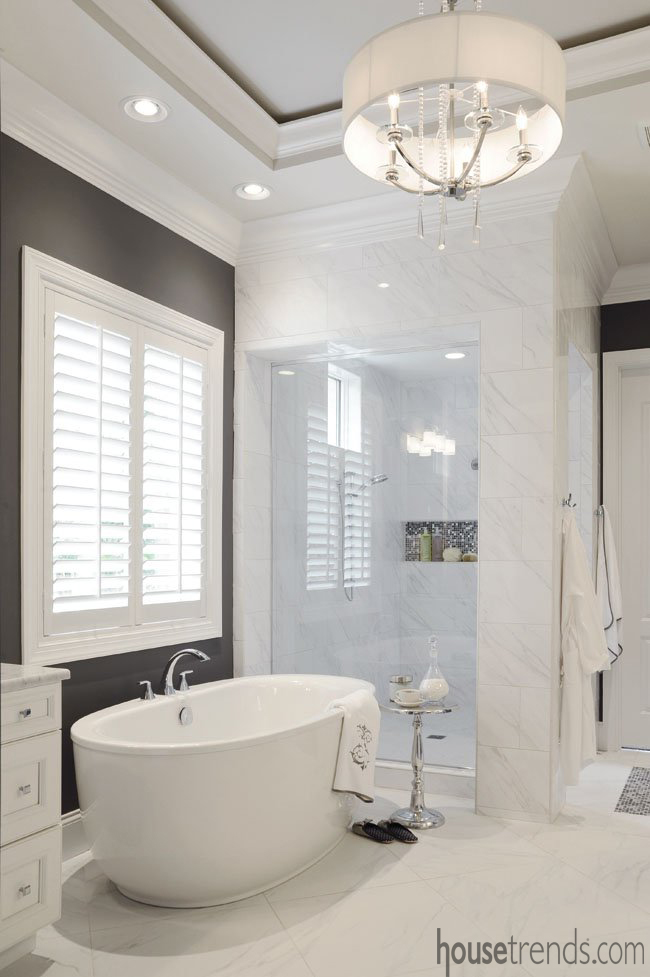 Natural light shines on this Kohler tub and nearby space