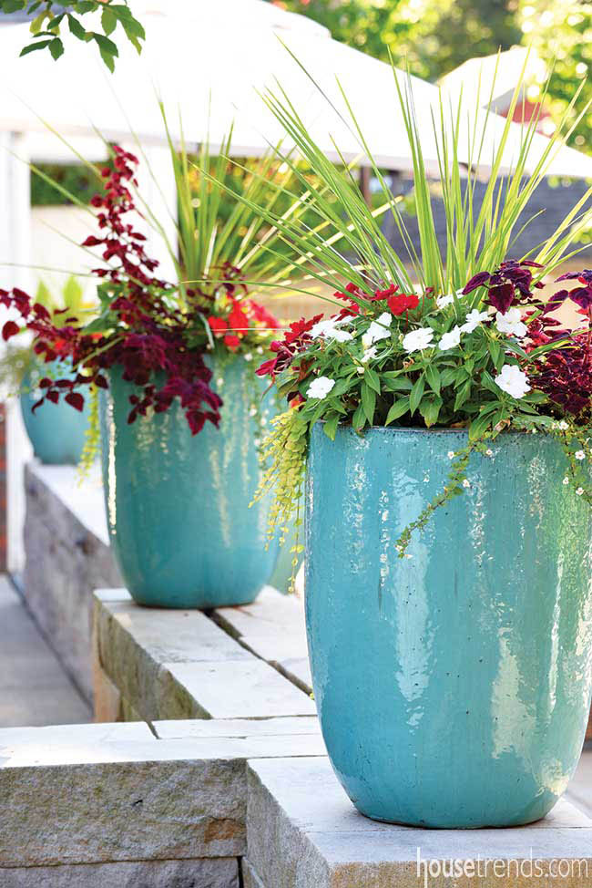 Flower pots color up a back yard