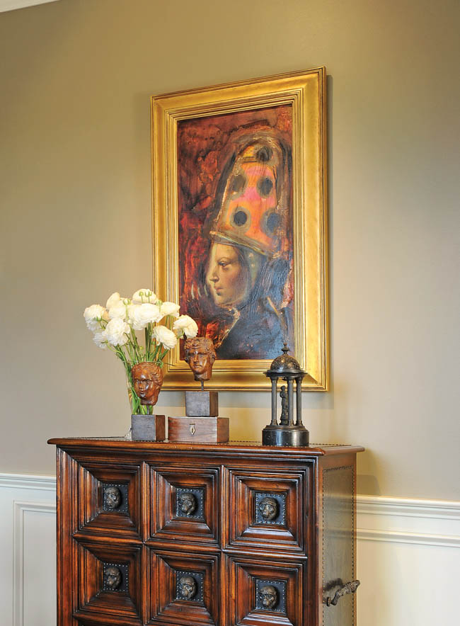 Dining room boasts a wide array of wall art