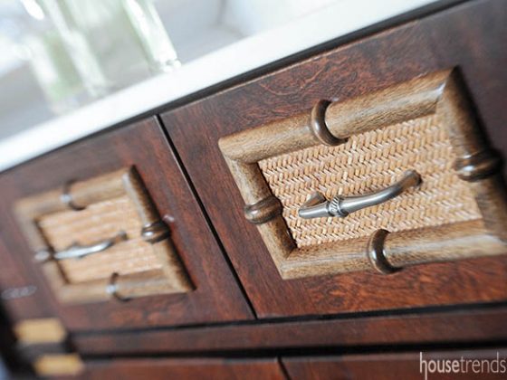Bathroom vanity cabinet mimics antique dresser