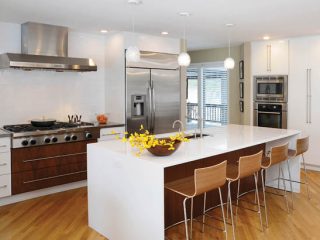 Roomy kitchen cabinets give plenty of storage space