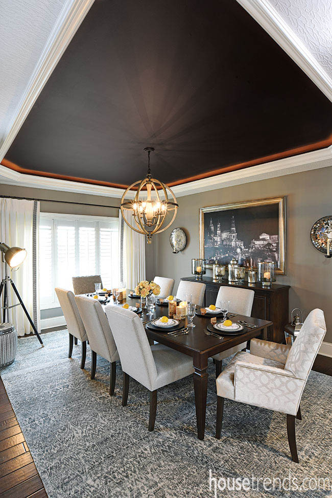 Orbit light fixture shines in a formal dining room