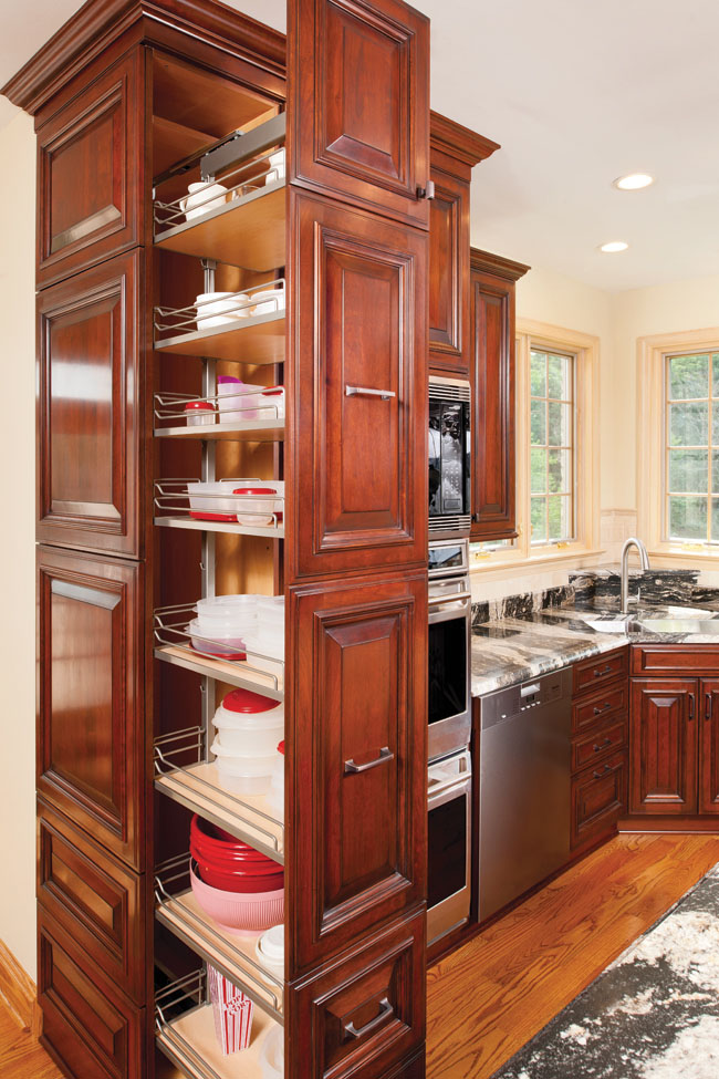 Pullout cabinetry provides hidden storage