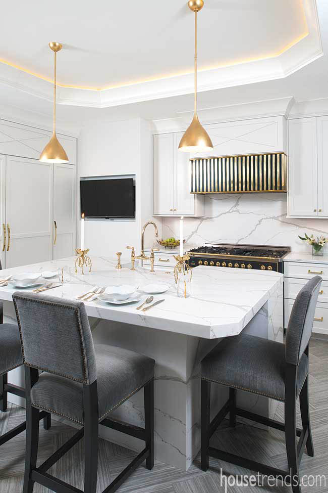Bead lighting in a dramatic white kitchen