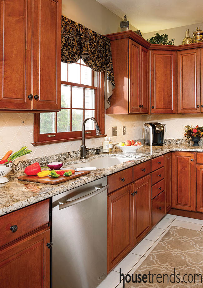 Granite countertops complement cabinetry