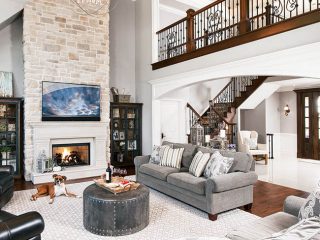 Elegant chandelier dangles over a great room