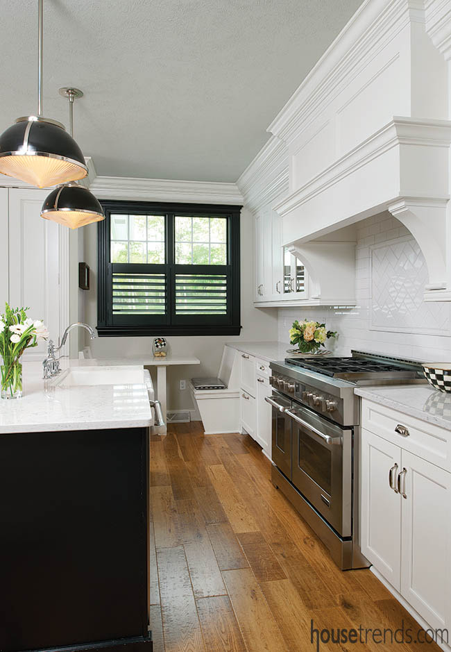 Wide plank hardwood flooring adds a rustic touch