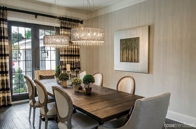 Dining room curtains help to soften this inviting eating space