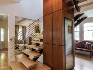 Staircase design hides a wine cooler