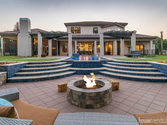 Stairs lead down to a sunken fire pit