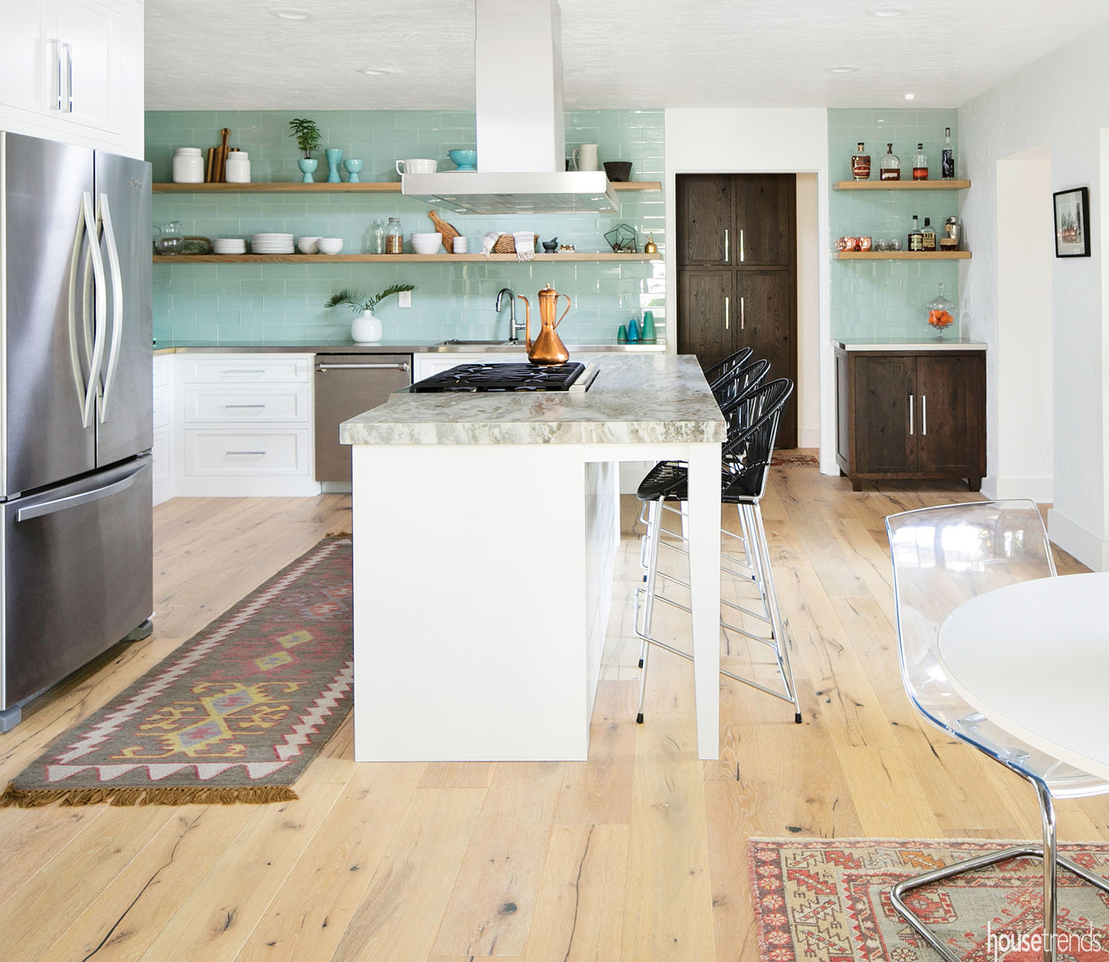 Oak hardwood floors run through a kitchen