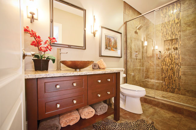 Glass shower door keeps a bathroom modern