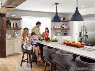 Family prepares dinner in new kitchen