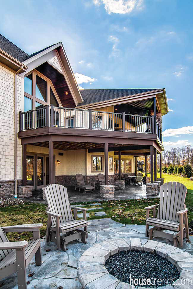 Gas fire pit warms up a back yard