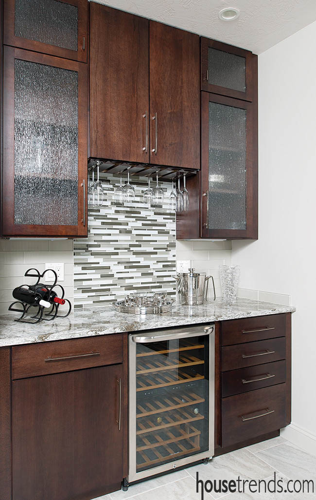 Cabinetry offsets a wine bar