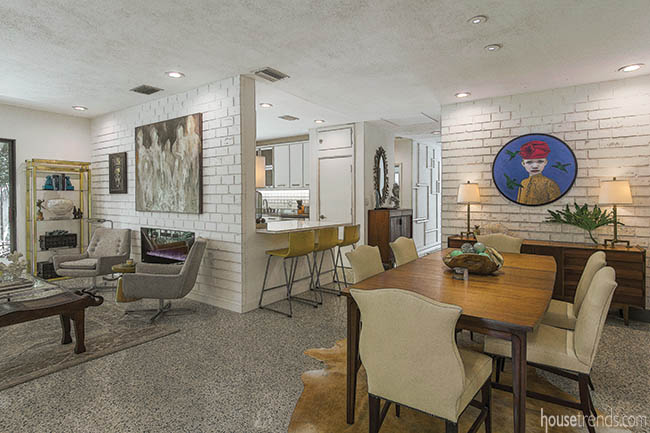 Circular painting draws attention in a dining room