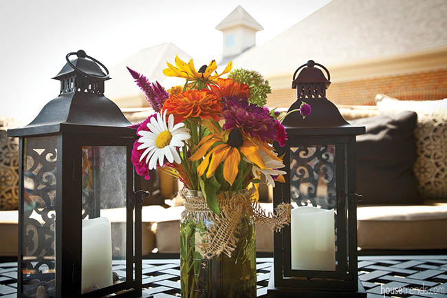 Colorful perennial flowers dress up an outdoor table