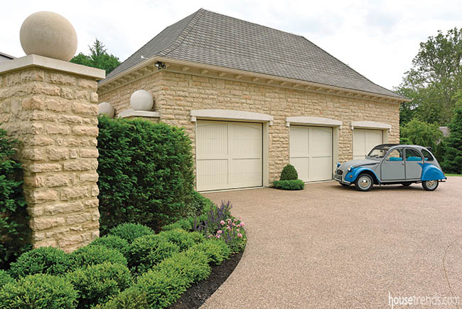 Three-car garage allows owner to indulge a hobby