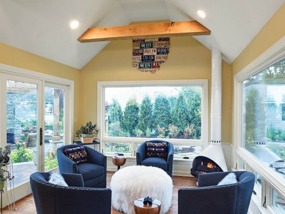 Windows dominate a sitting room
