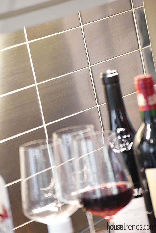 Stainless steel backsplash shines in a kitchen