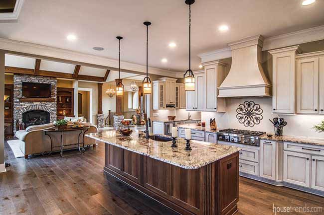 Granite countertops shine in an open kitchen design