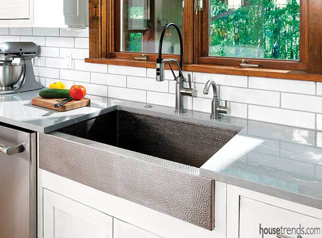 Kitchen remodel features nickel farmhouse sink