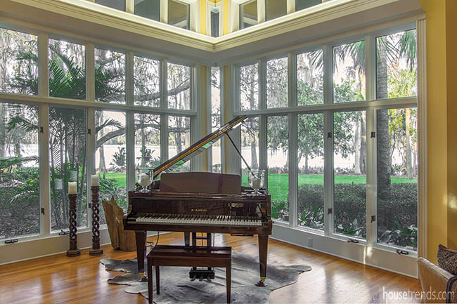 Piano tucked into a glass corner