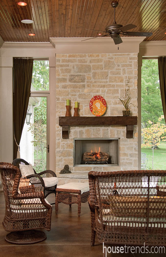Outdoor fireplace warms up an open-air patio