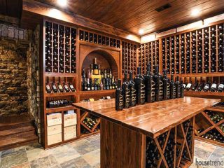 Stone stairway empties into a wine cellar