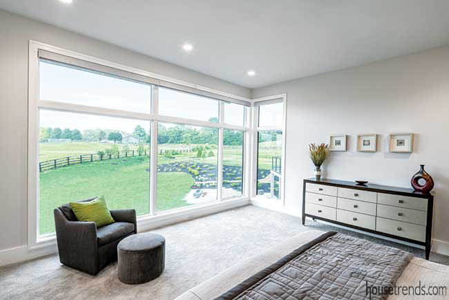 Master bedroom boasts wall of windows