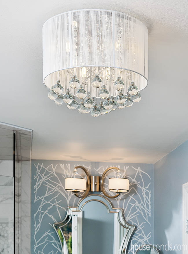 Elegant chandelier brightens up a master bath