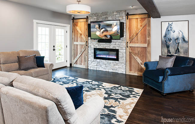 Barn doors add rustic vibe to a lower level