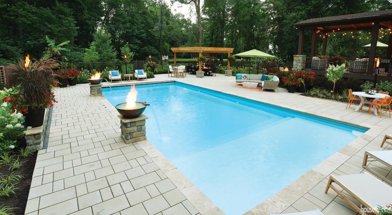 Fire bowls add romance to a swiming pool