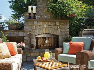 Patio and outdoor fireplace create entertaining haven