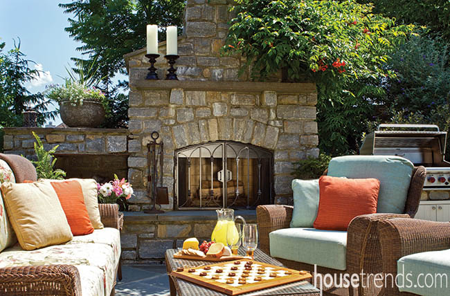 Patio and outdoor fireplace create entertaining haven